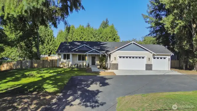 Front elevation of home with a 3 car garage