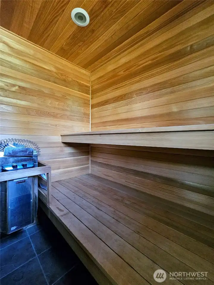 Sauna is off the downstairs shower.