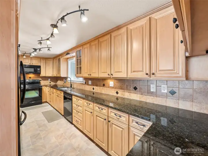 Beautiful Kitchen with Tons of Cupboards and Counterspace.