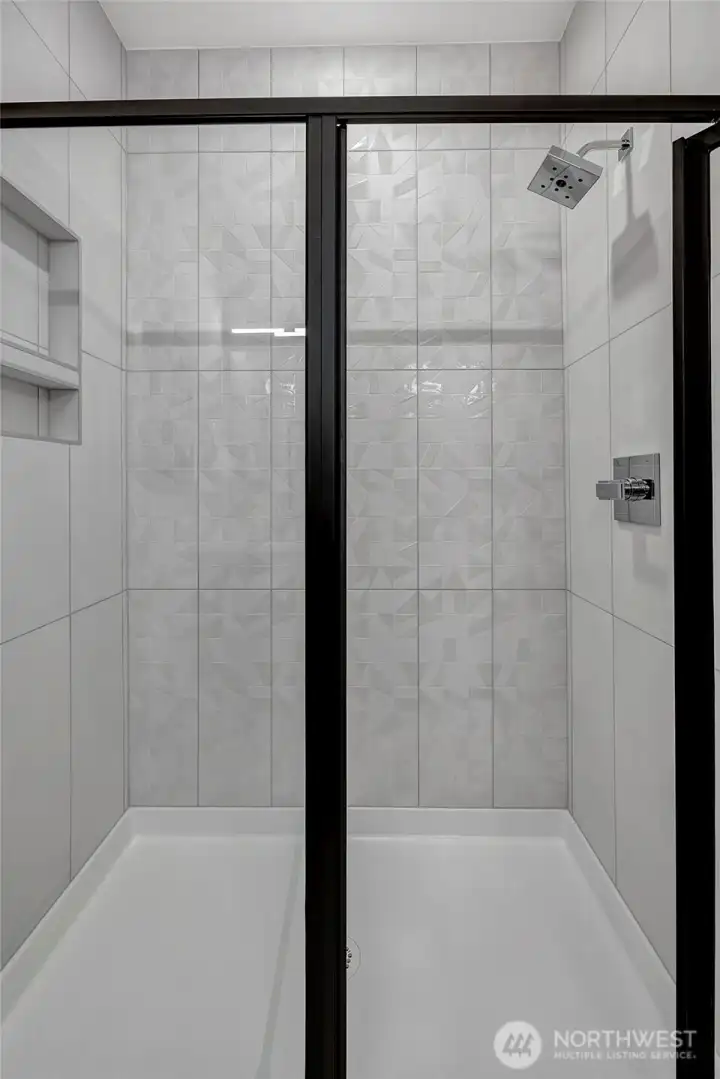 Full tile shower in primary bath (photos of lot34, same floorplan)