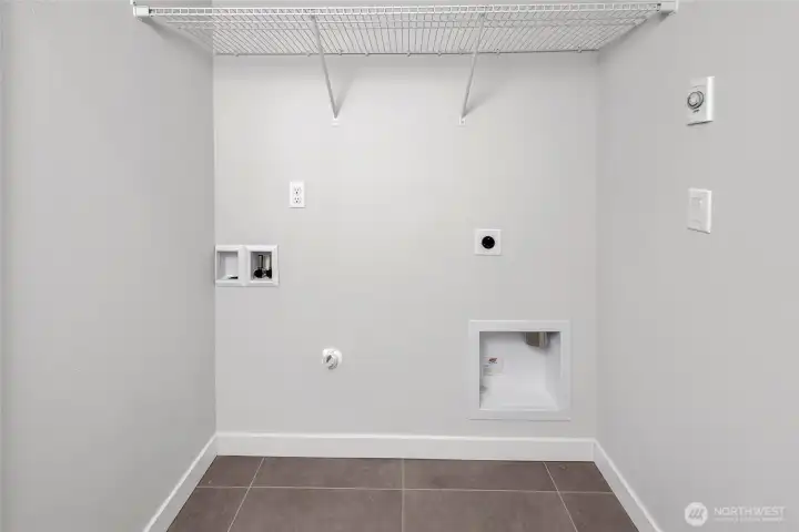 Conveniently located laundry room on upper floor (photos of lot34, same floorplan)