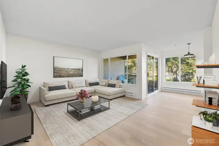 Get cozy and relax in your living room. Virtually staged.