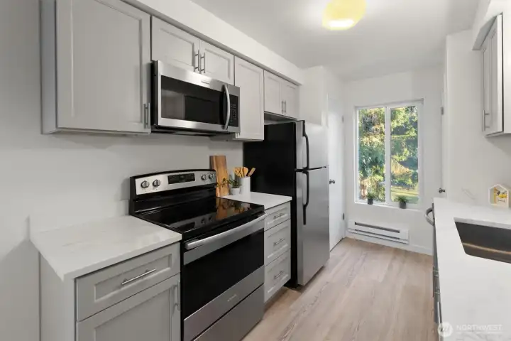 Newer stainless steel appliances make this kitchen a dream.