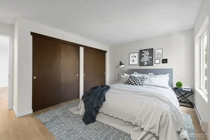 Large bedroom with two large closets. Virtually staged.