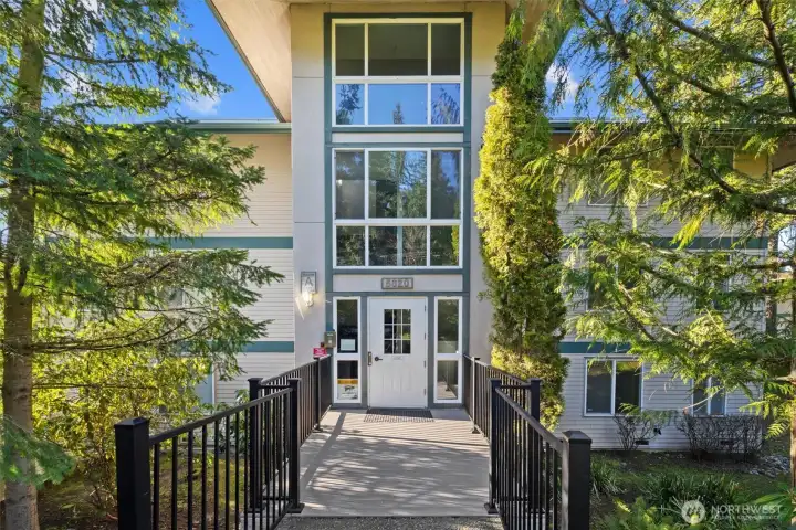 East entrance to building near clubhouse. Easy access to condo from this entrance.