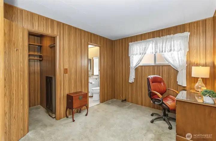2nd Bedroom with ornate paneling & walk in closet