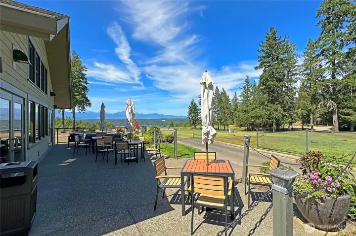 The Clubhouse Restaurant gazes out to the majestic Olympic Mountains. Cheers!