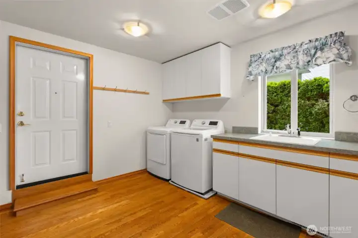Main floor laundry room with tons of space