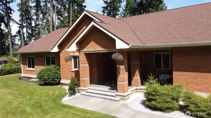 Experience ultimate privacy and luxury in this impressive single-story brick home, offering 2,696 sqft, 4 beds, 2.5 baths, with soaring cathedral ceilings and pristine hardwood floors. 2012 quality construction by one of the areas premier stone masons with no OSB. Entire home boasts high-end finishes throughout. Highlights include 9 foot ceilings, solid wood trim and doors, granite countertops, soft close cabinets, beautiful stone hearth, hardwoods through main living, wood burning stove, and spa-like stone and granite two-headed shower in primary suite. Climate-controlled comfort provided by a high-efficiency heat pump/AC. Entertain year-round with a flowing great room concept that spills through French doors onto the large enclosed, tongue & groove sunroom/patio. Fully fenced and gated backyard area. Experience ultimate privacy and luxury in this impressive single-story brick home, offering 2,696 sqft, 4 beds, 2.5 baths, with soaring cathedral ceilings and pristine hardwood floors. 2012 quality construction by one of the areas premier stone masons with no OSB. Entire home boasts high-end finishes throughout. Highlights include 9 foot ceilings, solid wood trim and doors, granite countertops, soft close cabinets, beautiful stone hearth, hardwoods through main living, wood burning stove, and spa-like stone and granite two-headed shower in primary suite. Climate-controlled comfort provided by a high-efficiency heat pump/AC. Entertain year-round with a flowing great room concept that spills through French doors onto the large enclosed, tongue & groove sunroom/patio. Fully fenced and gated backyard area.