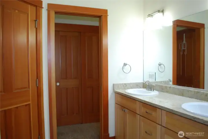 Looking back towards the door leading into on of the bedrooms which has a private entrance into the main bathroom. Looking back towards the door leading into on of the bedrooms which has a private entrance into the main bathroom.