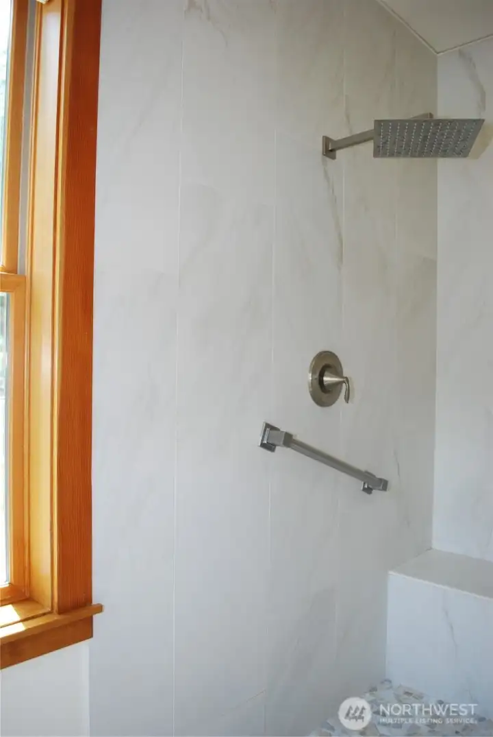 Large Primary suite with ceiling fan and generous sized bath. Two sinks with granite counter tops, separate toilet closet, big walk in closet, and a spa like granite and stone double headed shower. Large Primary suite with ceiling fan and generous sized bath. Two sinks with granite counter tops, separate toilet closet, big walk in closet, and a spa like granite and stone double headed shower.