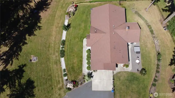 Other property perks include a hot tub, covered RV parking, separate well house, and a massive 3-bay, high-clearance shop featuring an EV charging plug and a built-in auto lift for the heavy-duty hobbyist. Country setting with no HOA on 4.29 wooded acres close-in to the city of Yelm. With access to shopping, restaurants, JBLM, I-5, Olympia, and Tacoma this home will not disappoint. 2026 Tax Assessed Value, $1,146,400. Other property perks include a hot tub, covered RV parking, separate well house, and a massive 3-bay, high-clearance shop featuring an EV charging plug and a built-in auto lift for the heavy-duty hobbyist. Country setting with no HOA on 4.29 wooded acres close-in to the city of Yelm. With access to shopping, restaurants, JBLM, I-5, Olympia, and Tacoma this home will not disappoint. 2026 Tax Assessed Value, $1,146,400.