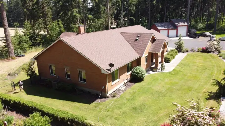 Other property perks include a hot tub, covered RV parking, separate well house, and a massive 3-bay, high-clearance shop featuring an EV charging plug and a built-in auto lift for the heavy-duty hobbyist. Country setting with no HOA on 4.29 wooded acres close-in to the city of Yelm. With access to shopping, restaurants, JBLM, I-5, Olympia, and Tacoma this home will not disappoint. 2026 Tax Assessed Value, $1,146,400. Other property perks include a hot tub, covered RV parking, separate well house, and a massive 3-bay, high-clearance shop featuring an EV charging plug and a built-in auto lift for the heavy-duty hobbyist. Country setting with no HOA on 4.29 wooded acres close-in to the city of Yelm. With access to shopping, restaurants, JBLM, I-5, Olympia, and Tacoma this home will not disappoint. 2026 Tax Assessed Value, $1,146,400.