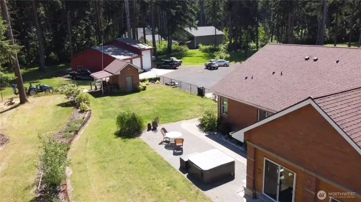 Other property perks include a hot tub, covered RV parking, separate well house, and a massive 3-bay, high-clearance shop featuring an EV charging plug and a built-in auto lift for the heavy-duty hobbyist. Country setting with no HOA on 4.29 wooded acres close-in to the city of Yelm. With access to shopping, restaurants, JBLM, I-5, Olympia, and Tacoma this home will not disappoint. 2026 Tax Assessed Value, $1,146,400. Other property perks include a hot tub, covered RV parking, separate well house, and a massive 3-bay, high-clearance shop featuring an EV charging plug and a built-in auto lift for the heavy-duty hobbyist. Country setting with no HOA on 4.29 wooded acres close-in to the city of Yelm. With access to shopping, restaurants, JBLM, I-5, Olympia, and Tacoma this home will not disappoint. 2026 Tax Assessed Value, $1,146,400.