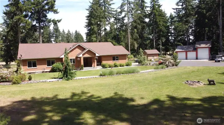 Other property perks include a hot tub, covered RV parking, separate well house, and a massive 3-bay, high-clearance shop featuring an EV charging plug and a built-in auto lift for the heavy-duty hobbyist. Country setting with no HOA on 4.29 wooded acres close-in to the city of Yelm. With access to shopping, restaurants, JBLM, I-5, Olympia, and Tacoma this home will not disappoint. 2026 Tax Assessed Value, $1,146,400. Other property perks include a hot tub, covered RV parking, separate well house, and a massive 3-bay, high-clearance shop featuring an EV charging plug and a built-in auto lift for the heavy-duty hobbyist. Country setting with no HOA on 4.29 wooded acres close-in to the city of Yelm. With access to shopping, restaurants, JBLM, I-5, Olympia, and Tacoma this home will not disappoint. 2026 Tax Assessed Value, $1,146,400.