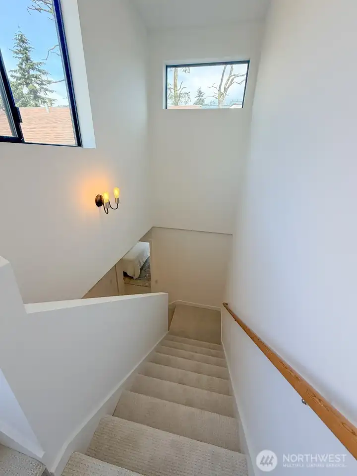 Stairs from roof to upper level