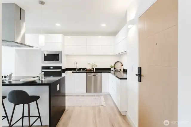 Staged unit. Photos are of unit #308.