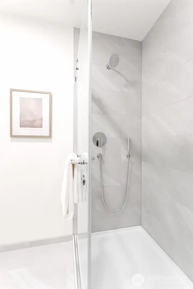 Tile flooring and shower.