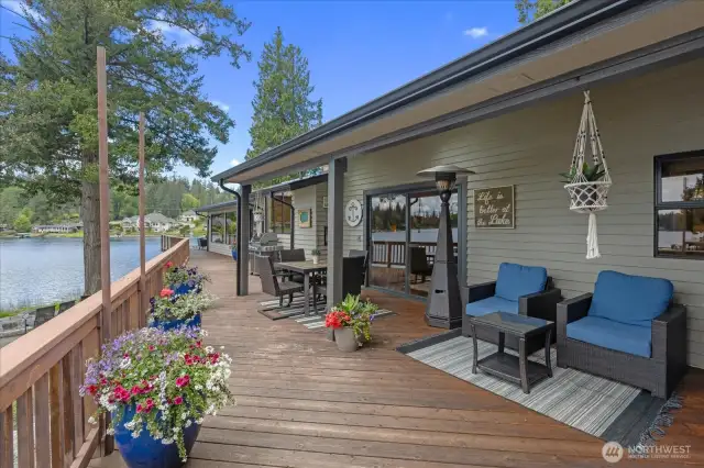 Wrap around deck to enjoy sun exposure morning through sunset. Covered patio area too.