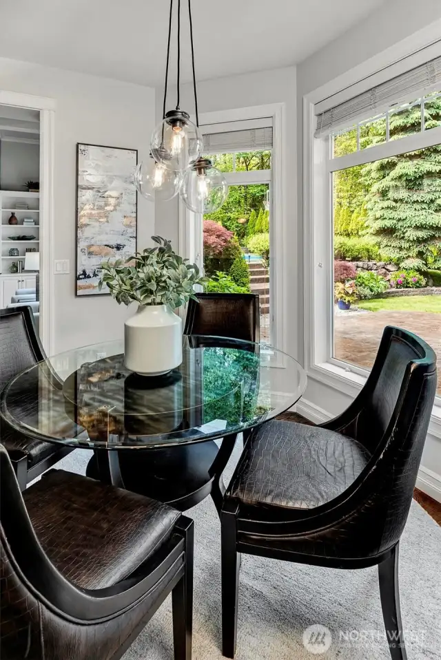 Dining space in kitchen area provides beautiful views.