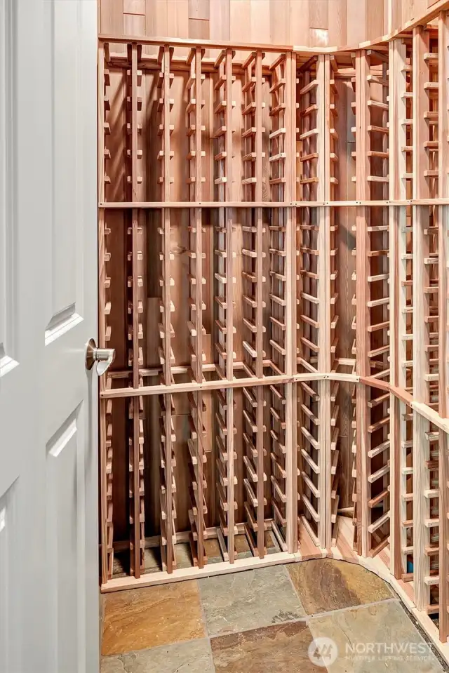 300 bottle capacity wine storage area right off of the wet-bar.