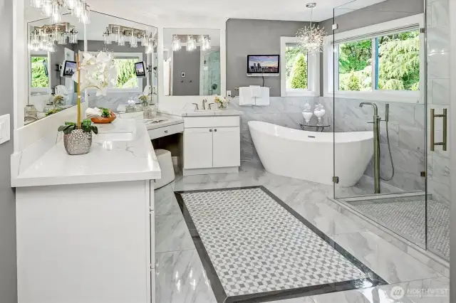 Heated marble and tile floors greet you as you enter this large and elegant en-suite.