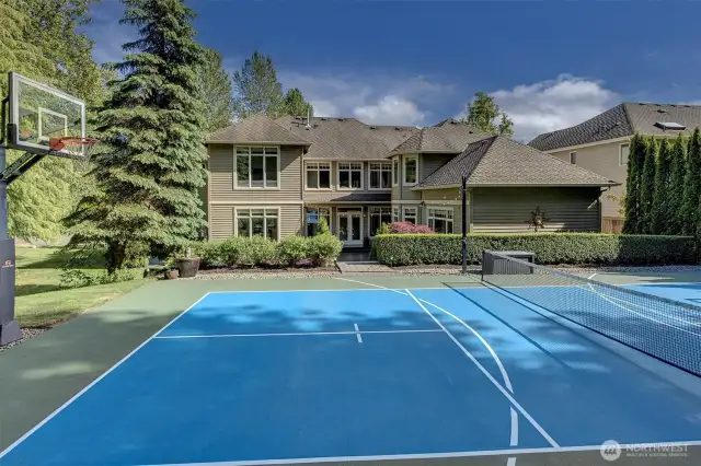 The sports court in the back yard will provide lots of fun and entertainment for everyone.  Imagine playing Pickleball, basketball, badminton, volleyball or just skating around on this court.