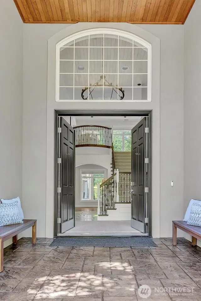 Double wide and extra tall doors at entry make for a grand entrance.