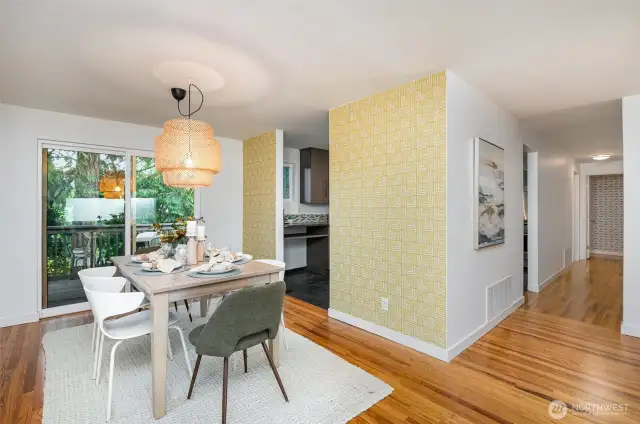 Beautiful dining room with slider to deck overlooking the backyard