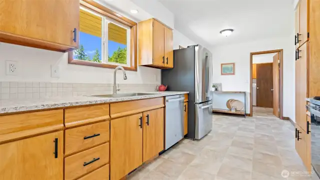 Kitchen is equipped with brand new, never been used, GE appliances
