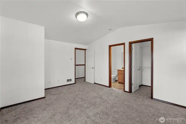 Another view of the primary bedroom—entire second floor is newly carpeted for a fresh, cozy feel.