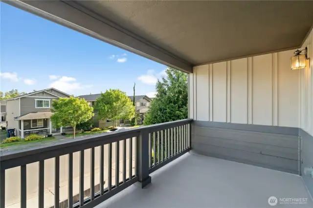 Private covered balcony located just off the primary bedroom—perfect for relaxing in your own secluded outdoor space.