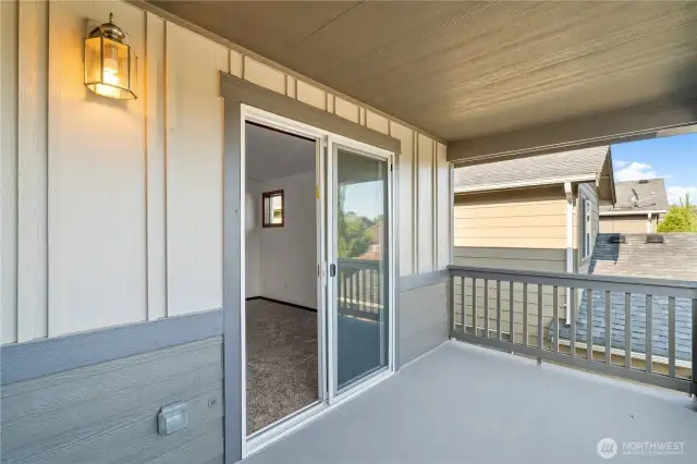 Enjoy peaceful mornings or relaxing evenings on this spacious outdoor balcony with serene views and fresh air.