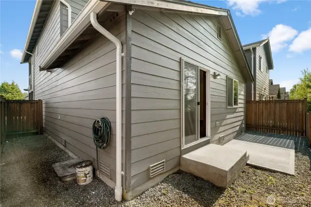 The low-maintenance backyard is perfect for relaxing.