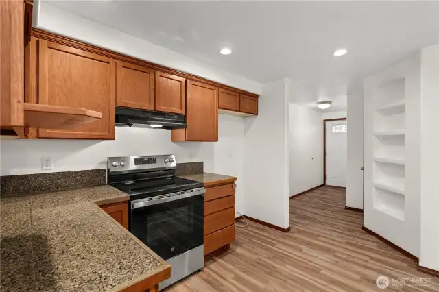 Another perspective of the kitchen highlights the home's seamless flow and functional layout.
