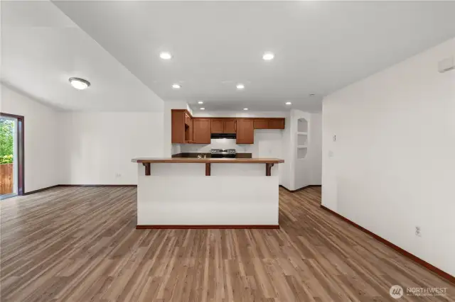 The opposite side of the island offers convenient seating—ideal for quick meals, morning coffee, or socializing while cooking.