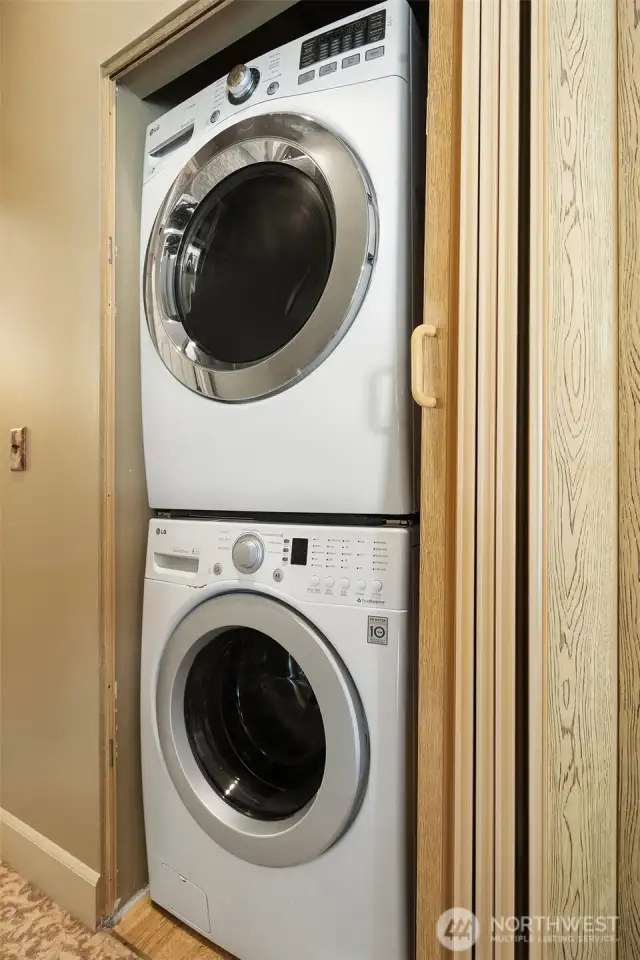 Stacking W/D off hallway to bedrooms and bath.