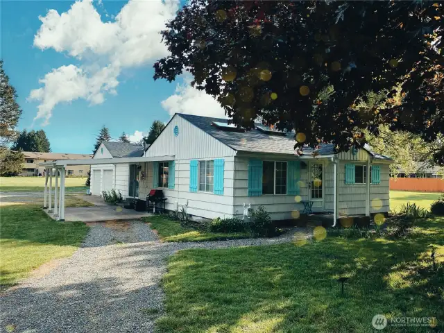 Privacy abounds with the home right in the middle of the acreage.