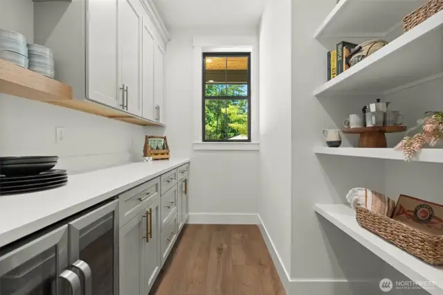 Butlers pantry with beverage fridge