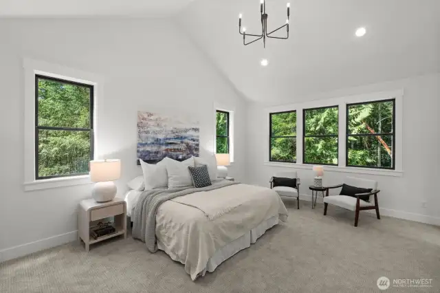 Primary suite with vaulted ceilings