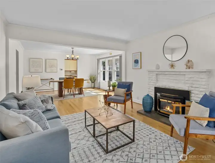 Interior has fresh paint, floors recently refinished.  Living room has natural gas fire place.