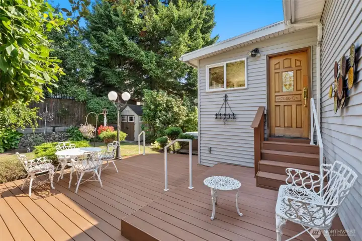 Sunny back deck with trex type decking.