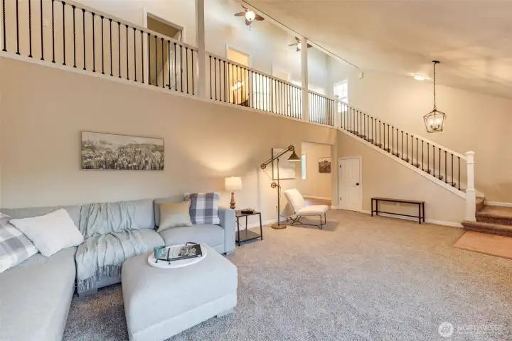 Bright and open living room offers plenty of space to relax, entertain and enjoy the warmth of this home.