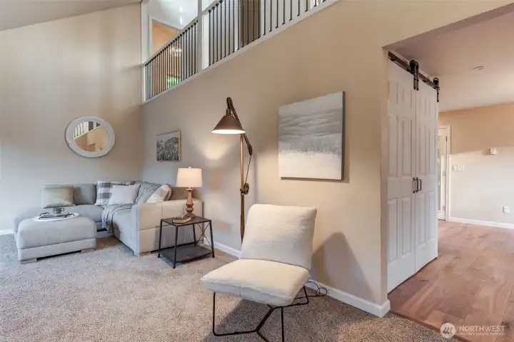Living room leads to a generously sized dining room.