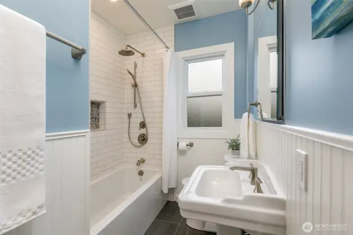 Main level full bathroom.