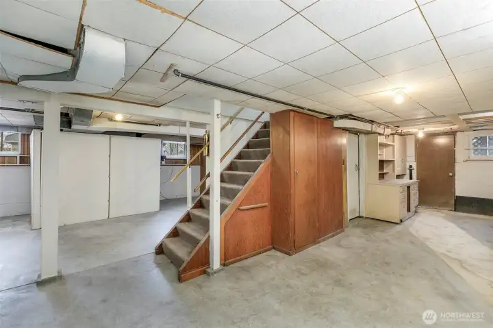 Lower level unfinished basement and laundry.