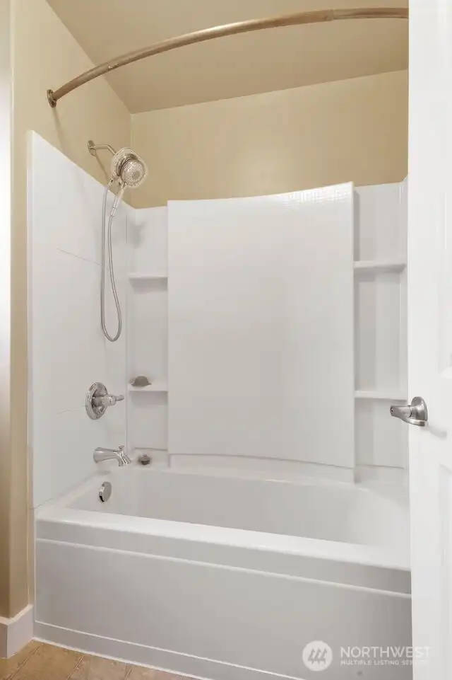 View of the main bathroom shower/tub.