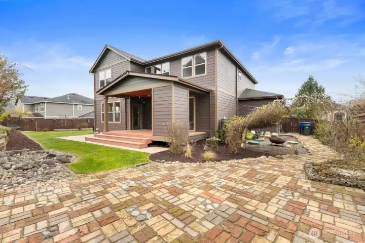 Additional Outdoor Features    Fully fenced and landscaped yard, two patios for additional seating areas, extra driveway and graveled parking, and seasonal holiday light outlets built into the eaves with garage switch for effortless decorating.