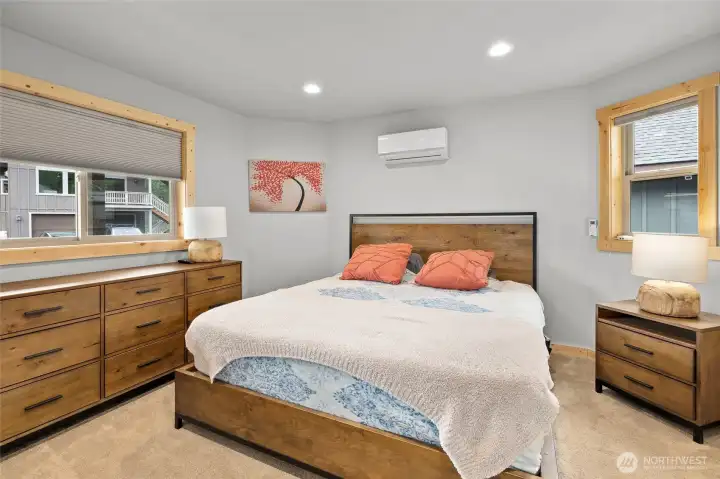 The primary bedroom includes a private, full bathroom for added comfort and convenience.