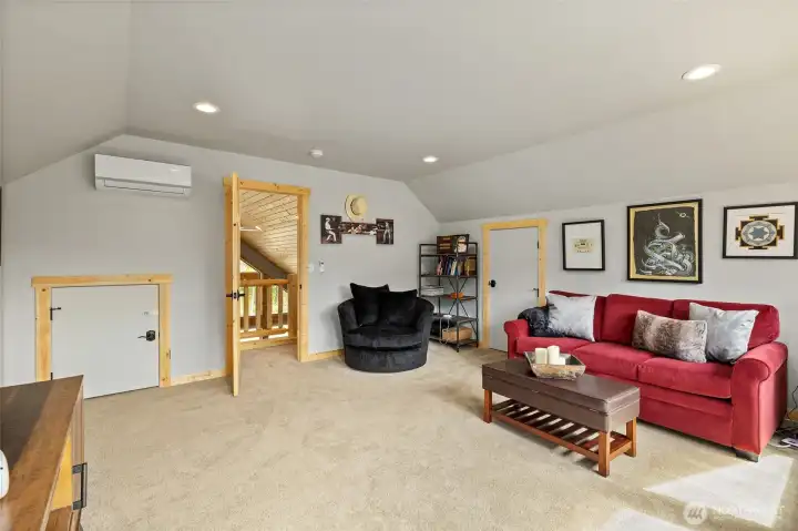 Fully furnished, the upstairs bunk room provides plenty of sleeping accommodations and can also serve as a fun recreational space.